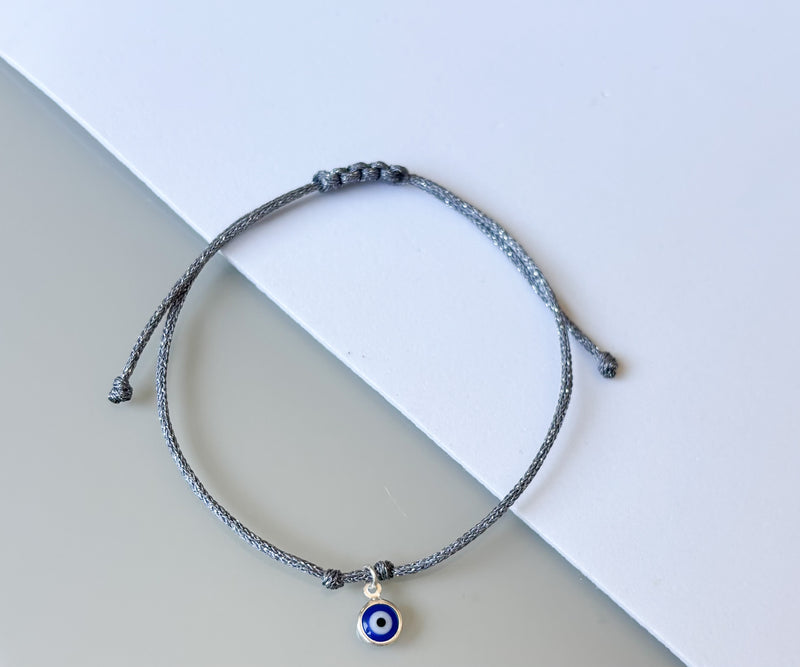 Pulseira de corda olho grego