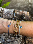 Pulseira de corda olho grego